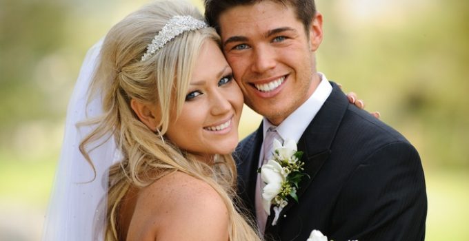Newlywed couple smiling